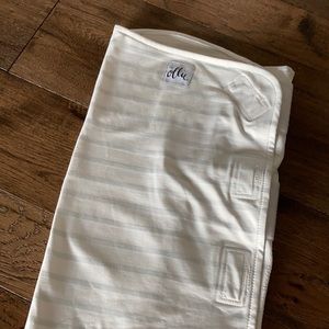 Ollie baby swaddle, gray and white.